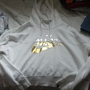 A white Nike cropped hoodie